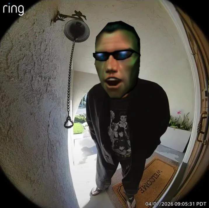 Doorbell Chud — Ring doorbell footage of a smiling man in a plaid shirt at a porch with a welcome mat